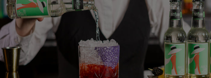 Bartender pouring cocktails with Amalfi Lime Tonic 